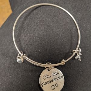 Expandable bracelet with charm says oh the places you will go